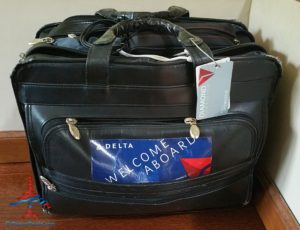 RenesPoints computer bag with Delta Welcome Aboard sticker