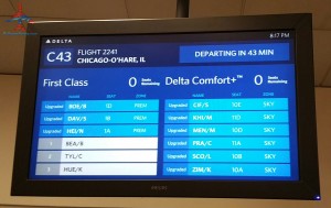 delta air line gids display for first class and comfort plus upgrade screen atlanta atl airport renespoints blog