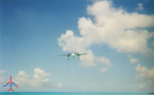 prop-jet-landing-maho-beach-sxm-renespoints-blog