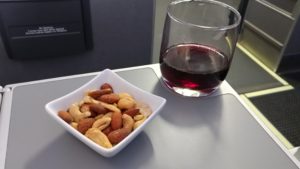 Hot nuts and wine on AA 1st class flight RenesPoints blog