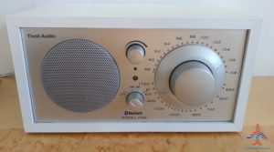 a white rectangular device with knobs and dials