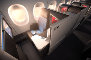 an airplane seat with a table and windows