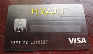 a black credit card with yellow text