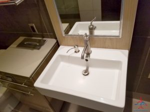 a sink with a faucet in a bathroom