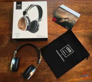 a headphones and a bag on a table