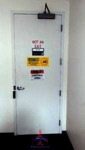 a white door with signs on it