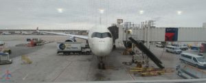 a white airplane at an airport