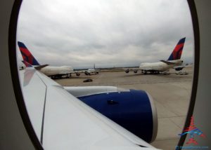 a close-up of airplanes on the runway