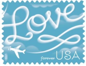 a blue stamp with words and airplane in the sky