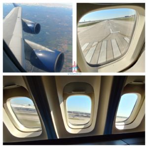 a plane's window with the wing and wing of an airplane
