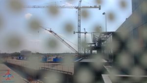 a construction site with cranes
