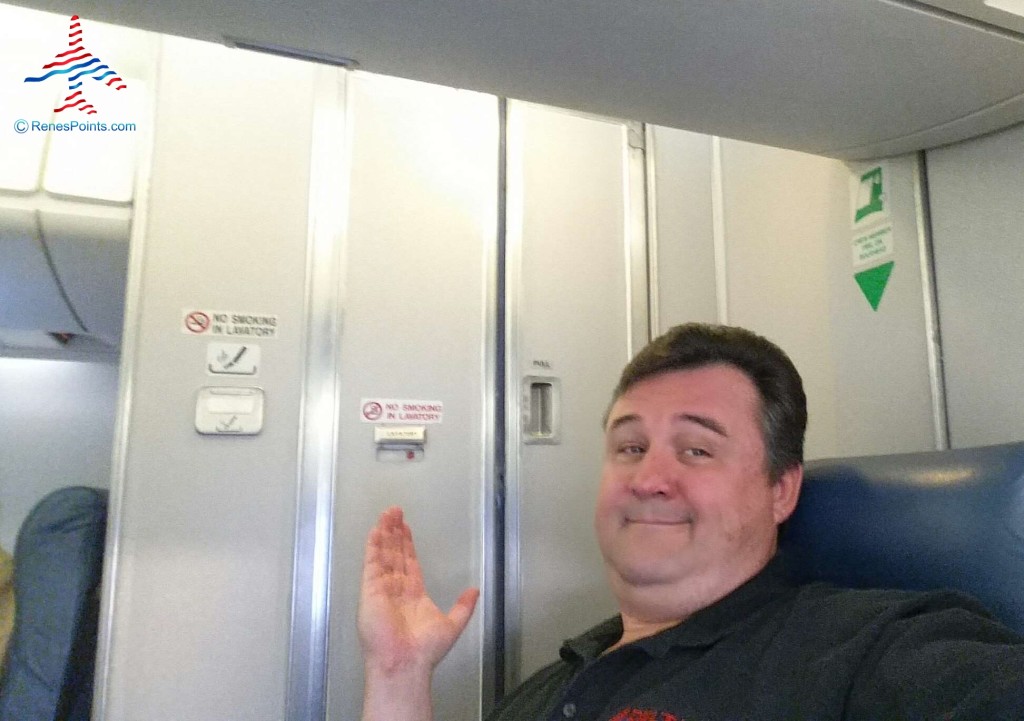 Seat next to a toilet onboard a Delta Connection CRJ-200 regional jet.