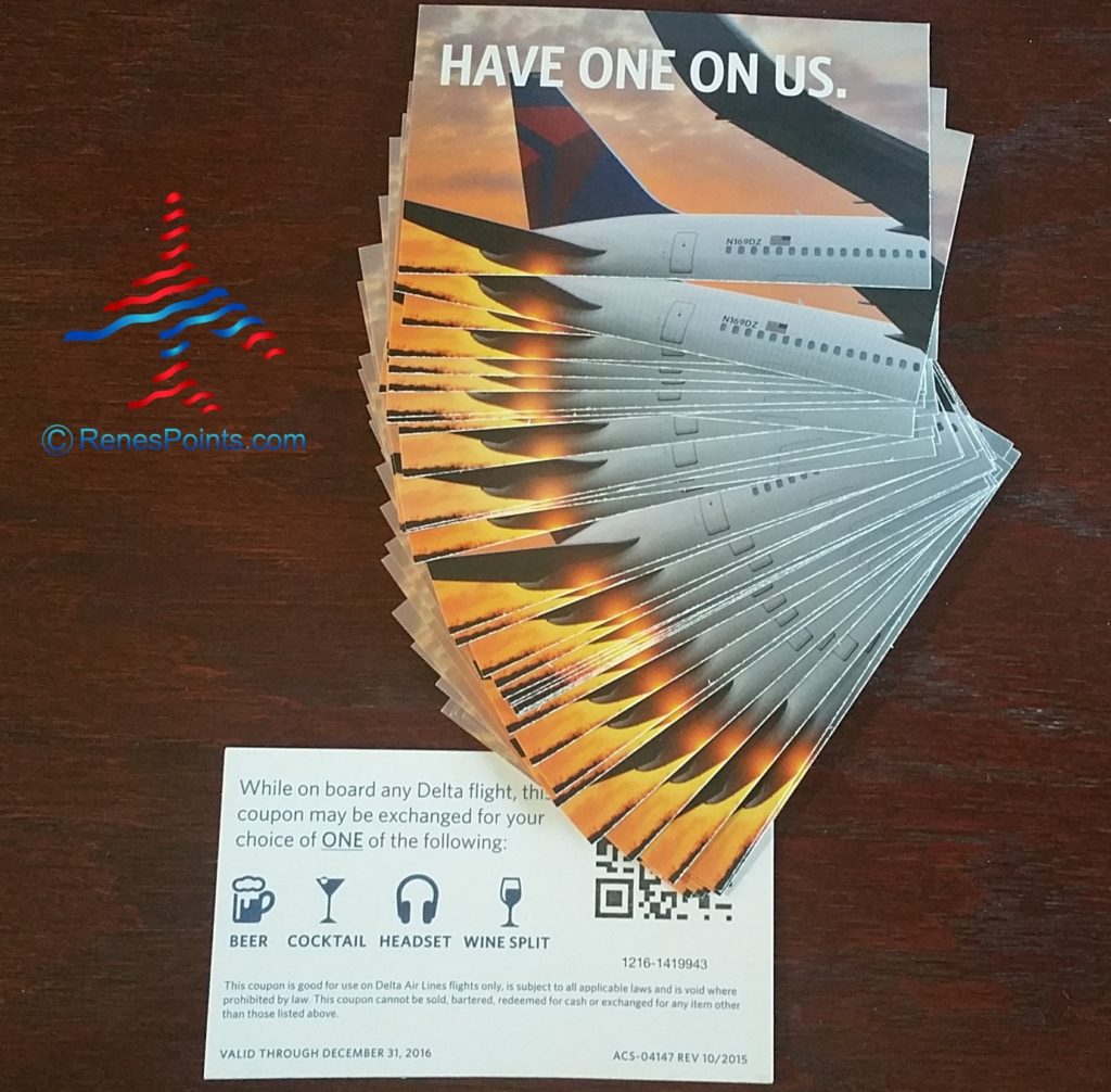 Stack of Delta Air Lines Have One on Us (or HOOU) drink coupons.
