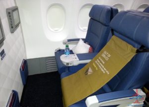 Row 1, seats 1C and 1D of the Delta Air Lines Boeing 737-900ER.