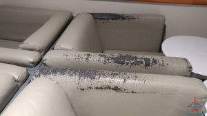 a white couch with black paint