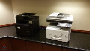 a printer and copier on a counter