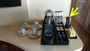 a coffee machine and coffee pods on a table