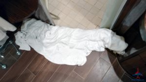a white towel on the floor