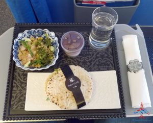 a tray with food and drinks on it