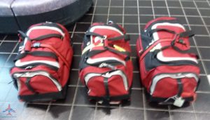 a group of red and black bags