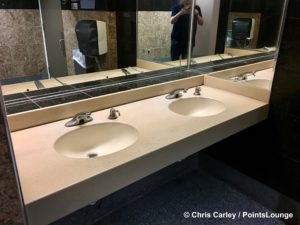 Men's restroom sinks are seen at The CLUB at SJC airport lounge at Norman Y. Mineta San Jose International Airport in San Jose, California.