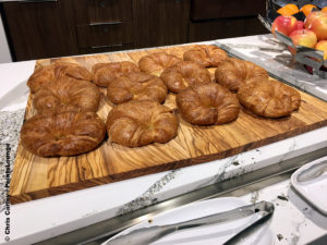 Croissants are seen at the breakfast buffet inside the Delta Sky Club Austin airport lounge at Austin-Bergstrom International Airport (AUS) in Austin, Texas. Photo © Chris Carley / PointsLounge