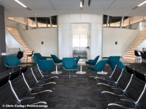 Two staircases and an elevator lead to the Delta Sky Club Austin airport lounge at Austin-Bergstrom International Airport (AUS) in Austin, Texas. Photo © Chris Carley / PointsLounge