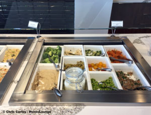 A salad bar is seen at the Delta Sky Club Austin airport lounge in Austin, Texas. Photo © Chris Carley / PointsLounge