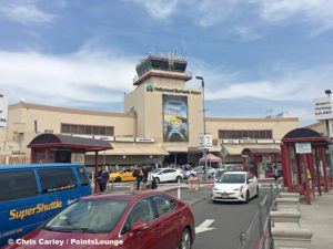 The control tower, main entrance, and terminals are seen at Burbank-Hollywood Airport - BUR - (also known as Bob Hope Airport) in Burbank, California.