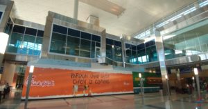 a large orange sign in a building