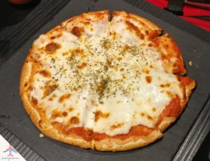 a pizza on a tray