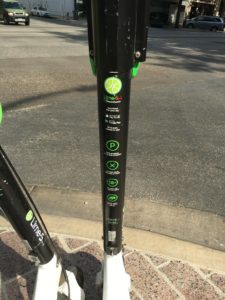 a black and green scooter