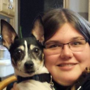 Lynsey Schroeder(R) and her dog Quasar. Delta Air Lines helped Ms. Schroeder get home to see her dying pet.