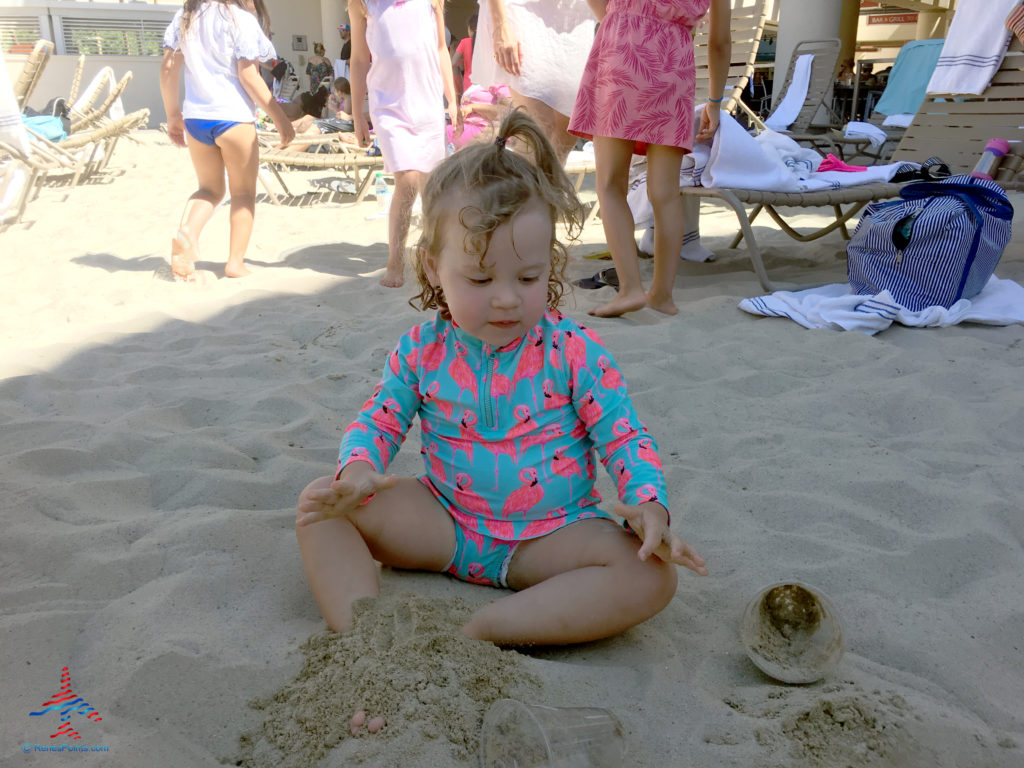 Daughter playing with sand at the Mandalay Bay Beach in Paradise, Nevada, outside of Las Vegas.