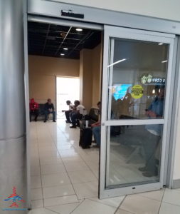 a group of people waiting in a waiting room