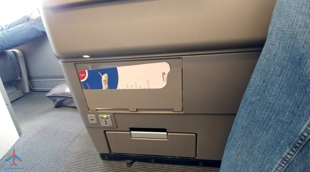 a seat with a paper in it