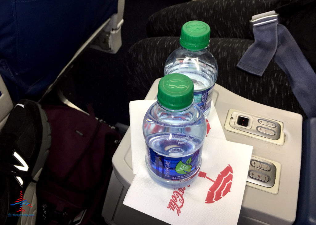 Two small bottles of Dasani Water are seen in the first class cabin of a Delta Air Lines Boeing 737 jet in Seattle, Washington.
