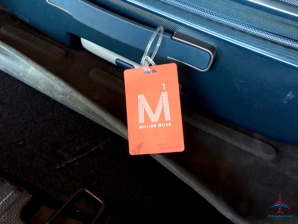 A Delta Million Miler brag tag on baggage.
