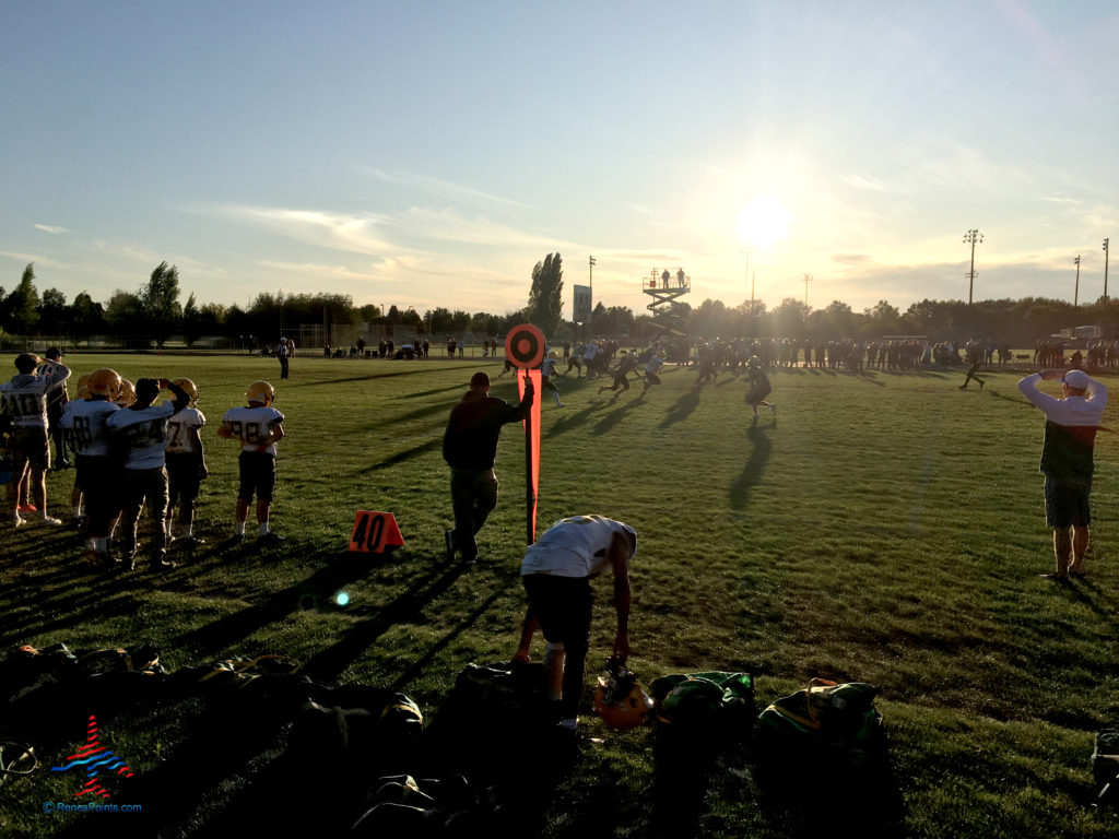 Two high school football teams play in Boise, Idaho.