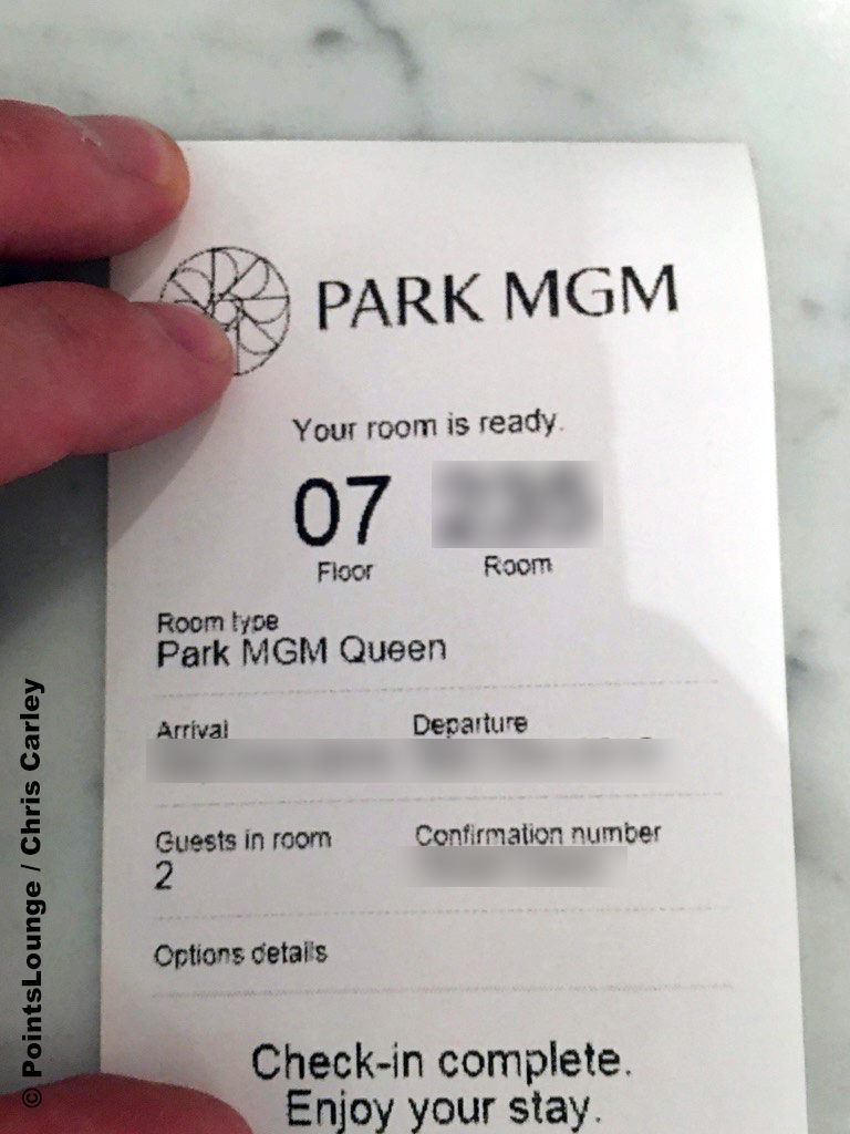 A Park MGM check-in receipt with room number, stay dates, and confirmation number.