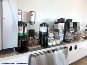 illy coffee is served at a coffee bar at the United Club LAX airport lounge in Los Angeles, California. © Chris Carley / PointsLounge.