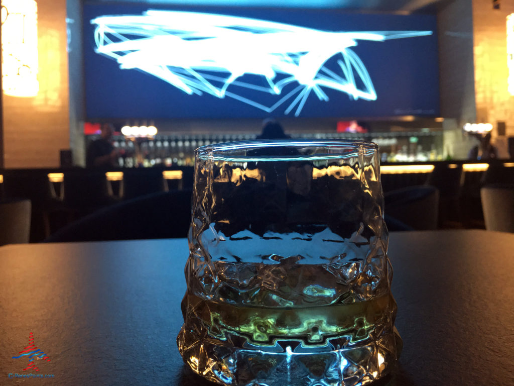 A Woodford Reserve bourbon whiskey is served on the rocks inside the bar of the Holiday Inn Express London Heathrow T4 and Crowne Plaza (LHR airport hotels) in Hounslow, United Kingdom.
