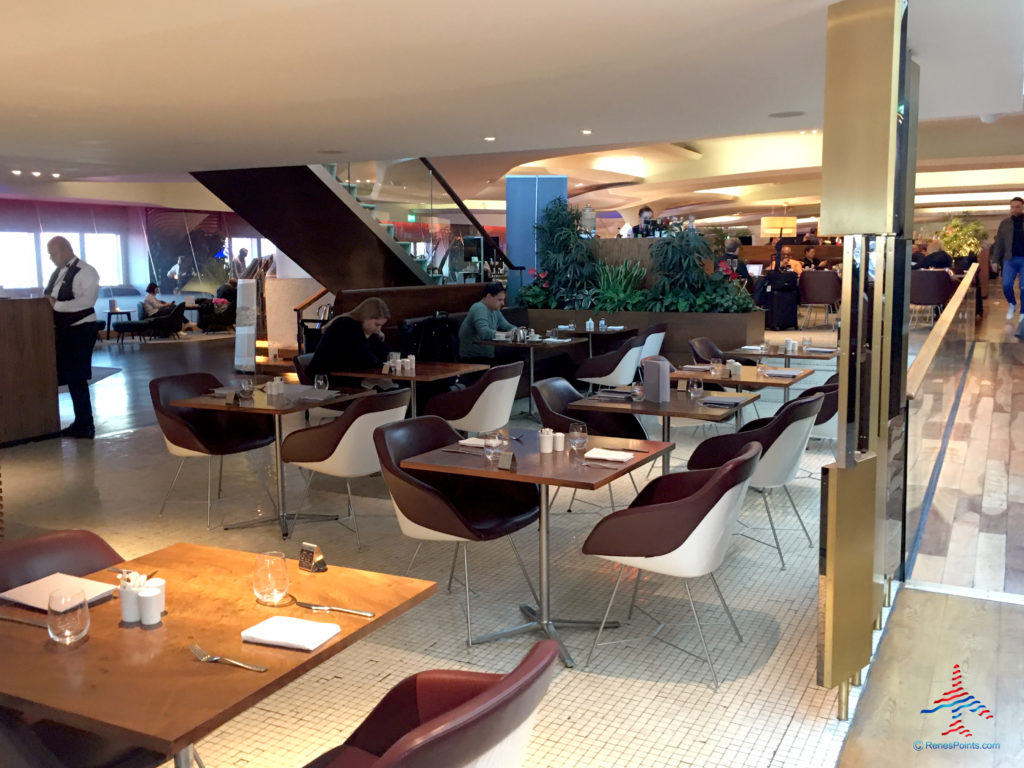 Cafe seating is seen inside the Virgin Atlantic Clubhouse airport lounge at London Heathrow Airport (LHR).