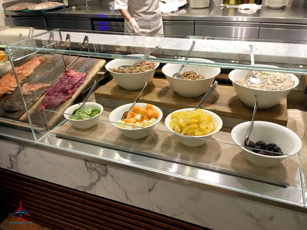 Cereal, oatmeal, and toppings are seen inside the Virgin Atlantic Clubhouse airport lounge at London Heathrow Airport (LHR).