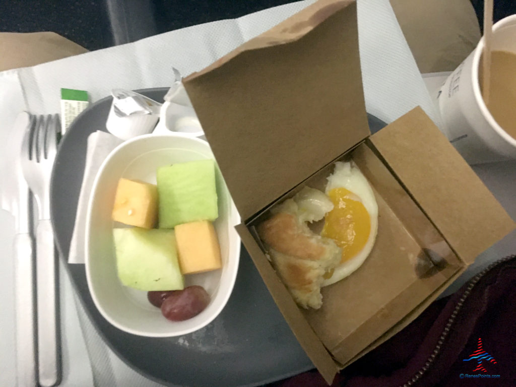 Melons and an egg and Swiss cheese croissant -- part of Delta's Main Cabin international experience -- is seen on a Boeing 767-300ER from Salt Lake City to Paris Charles de Gaulle.