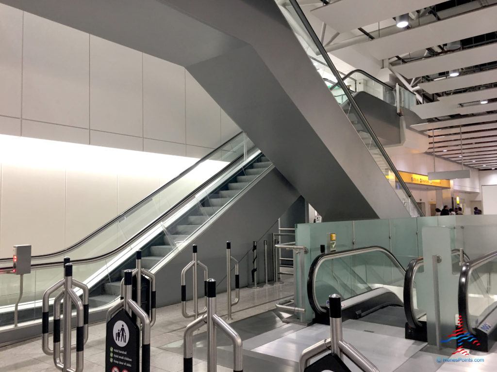 Elevators from The Tube and Heathrow Express are seen in London Heathrow Airport's Terminal 4. This way also leads guests to the Holiday Inn Express London Heathrow T4 (LHR airport hotel) in Hounslow, United Kingdom.