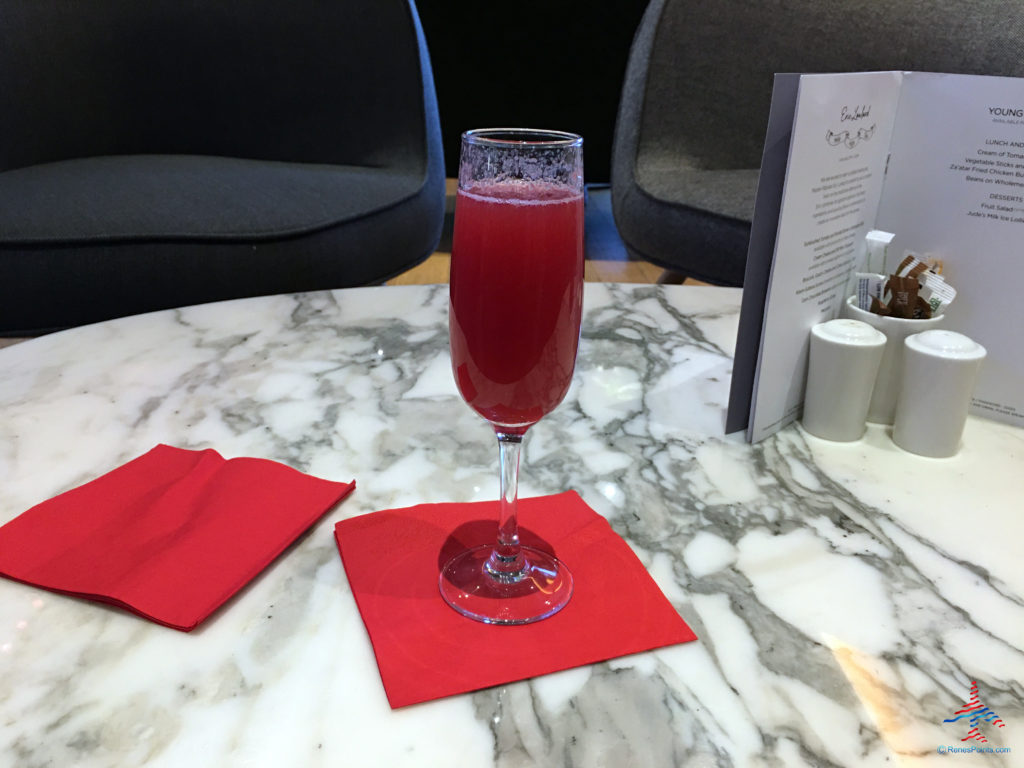 A Virgin Redhead signature cocktail is seen at the Virgin Atlantic Clubhouse airport lounge at London Heathrow Airport (LHR).