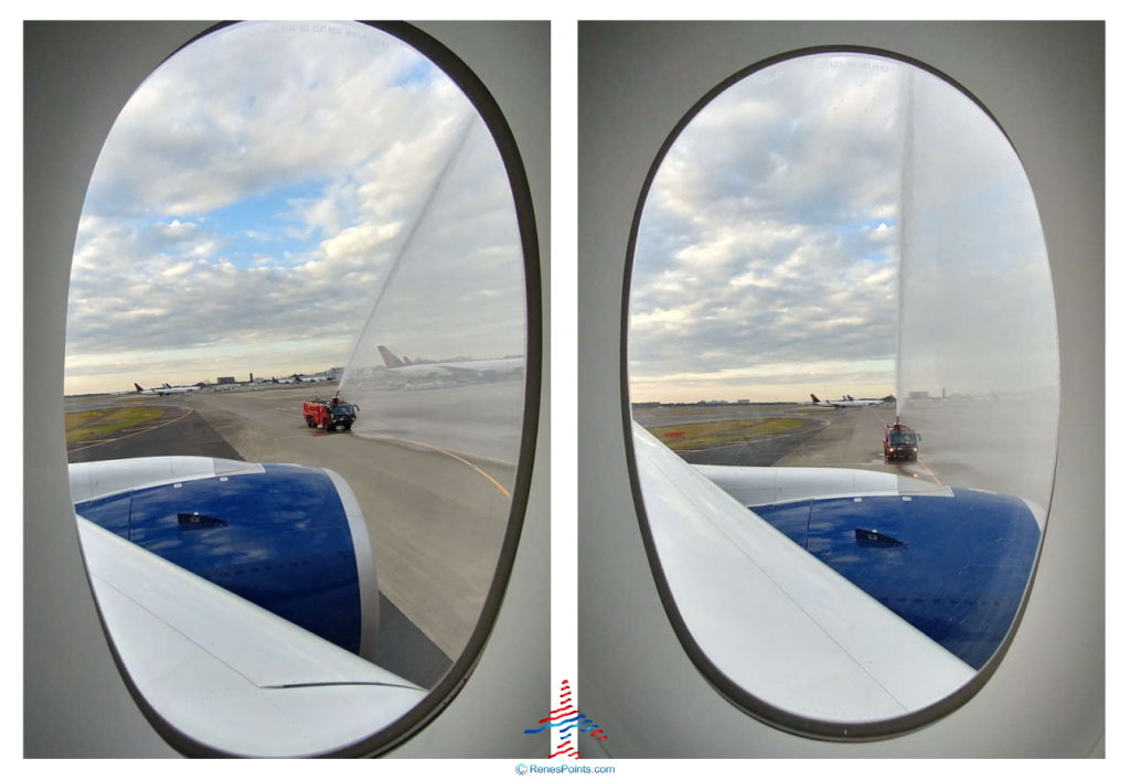 a plane's window with a jet engine
