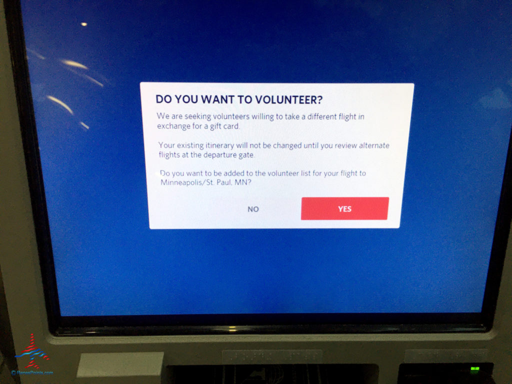 A Delta Air Lines check in kiosk solicits volunteers for an oversold flight.