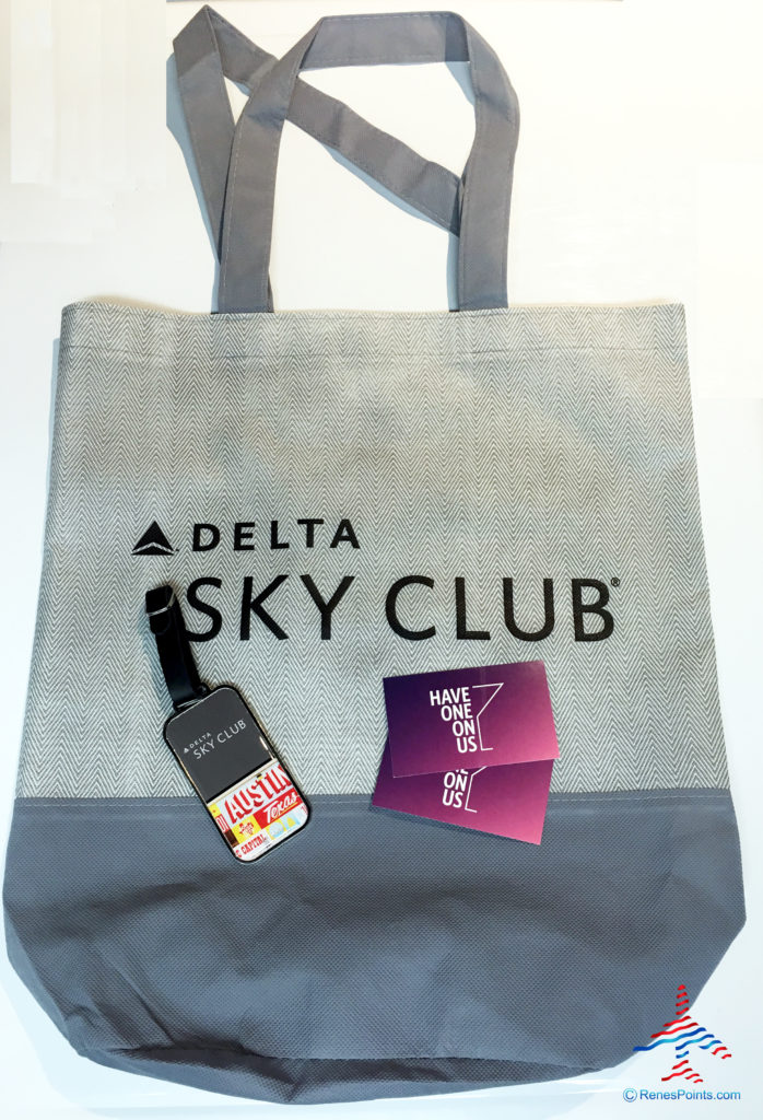 SWAG Saturday: Delta Sky Club reusable bag, Delta Air Lines Austin metal baggage tag, and two Have One on Us certificates.
